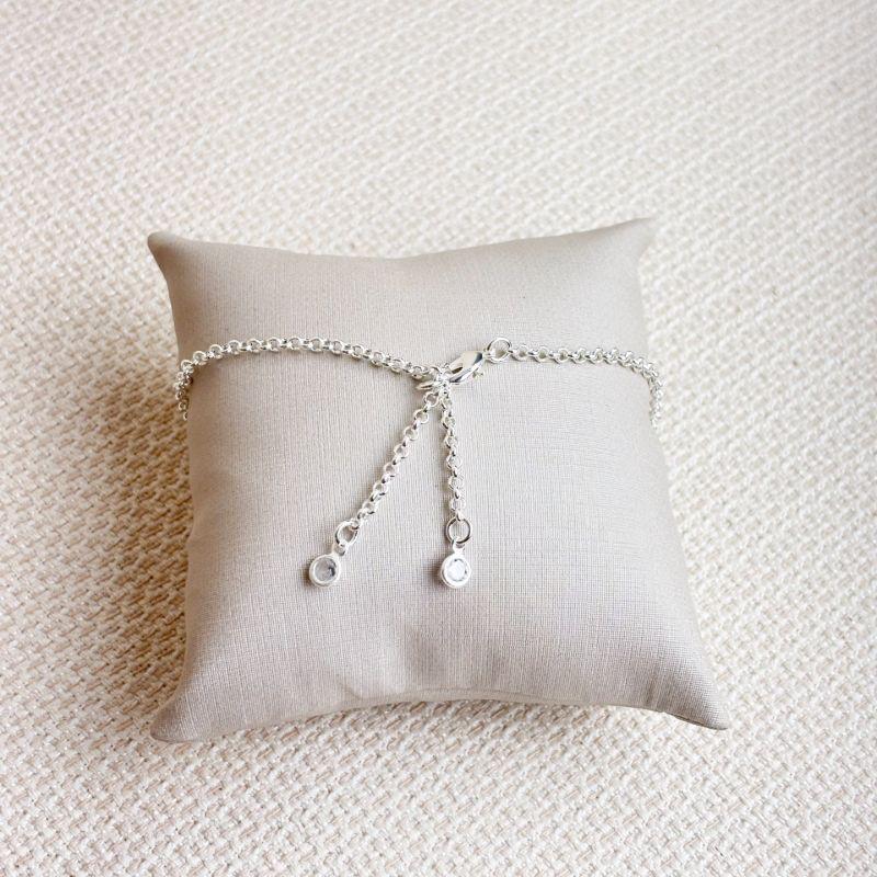 Tornozeleira Com Dois Pingentes Ponto de Luz  Folheada a Prata