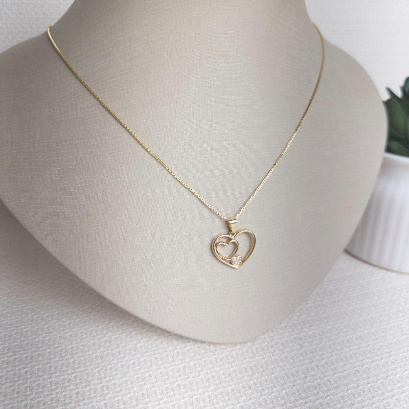 Colar Três Corações com Ponto de Luz em Zircônias Folheado a Ouro 18k
